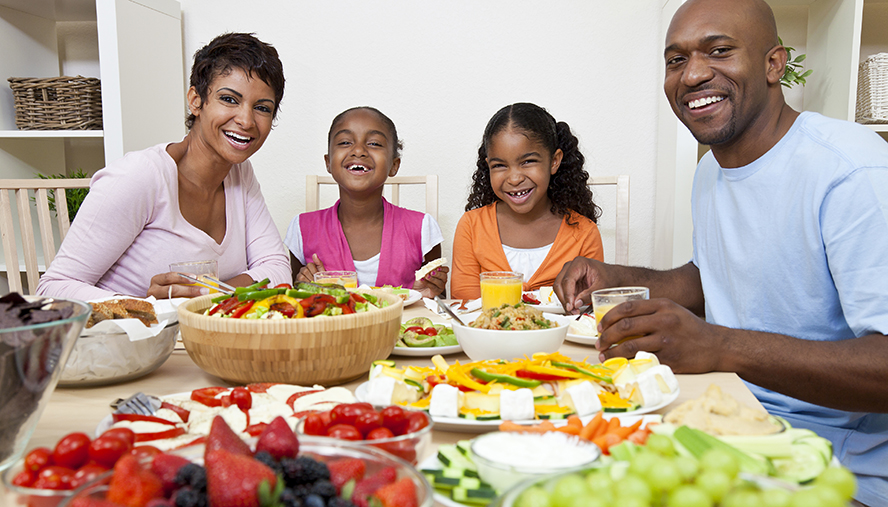 Family snacking on healthy food