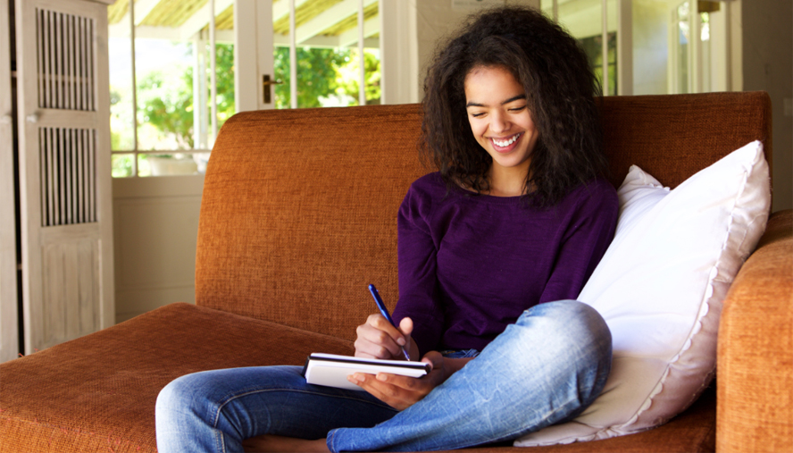 Woman journaling for her mental health