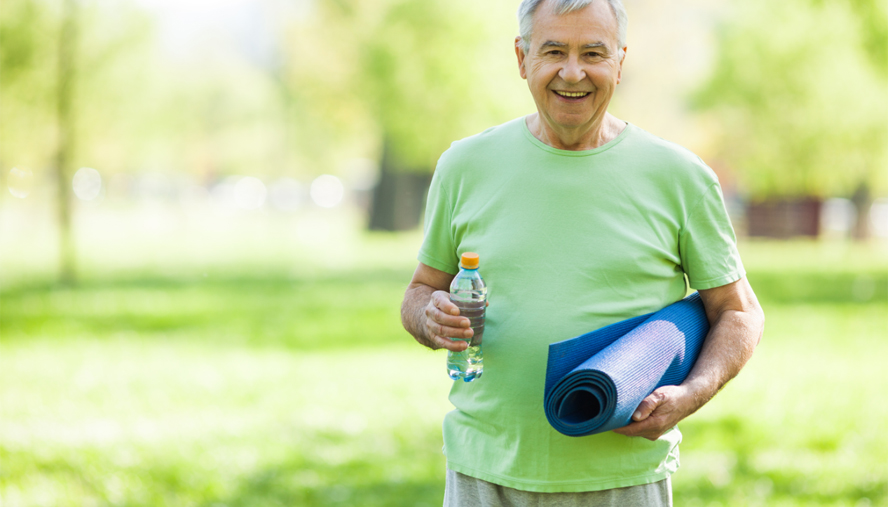 Older man doing yoga