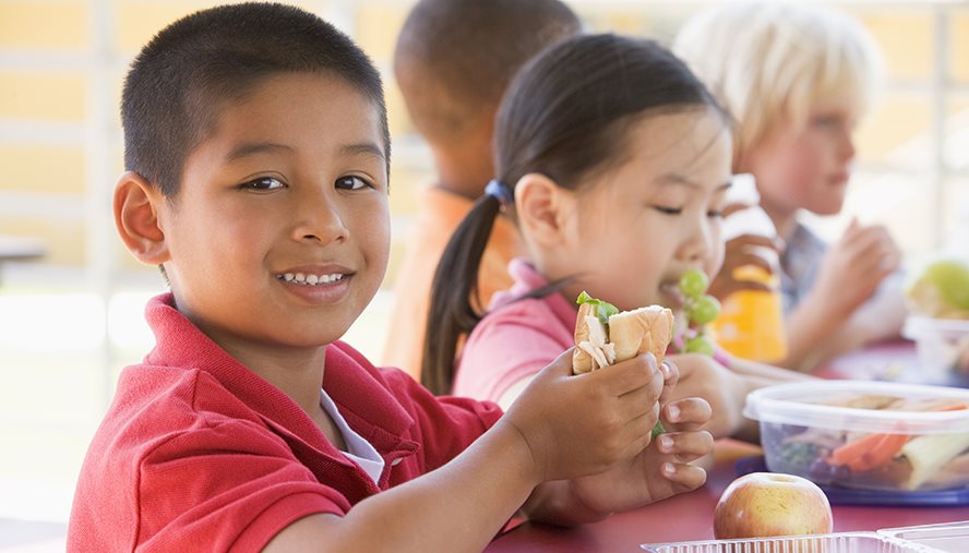 Child eating safe snacks at school