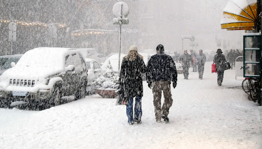 couple walking in the snow